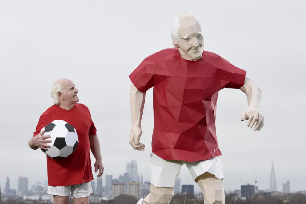 Dickie Borthwick Britains oldest footballer, with a paper sculpture.